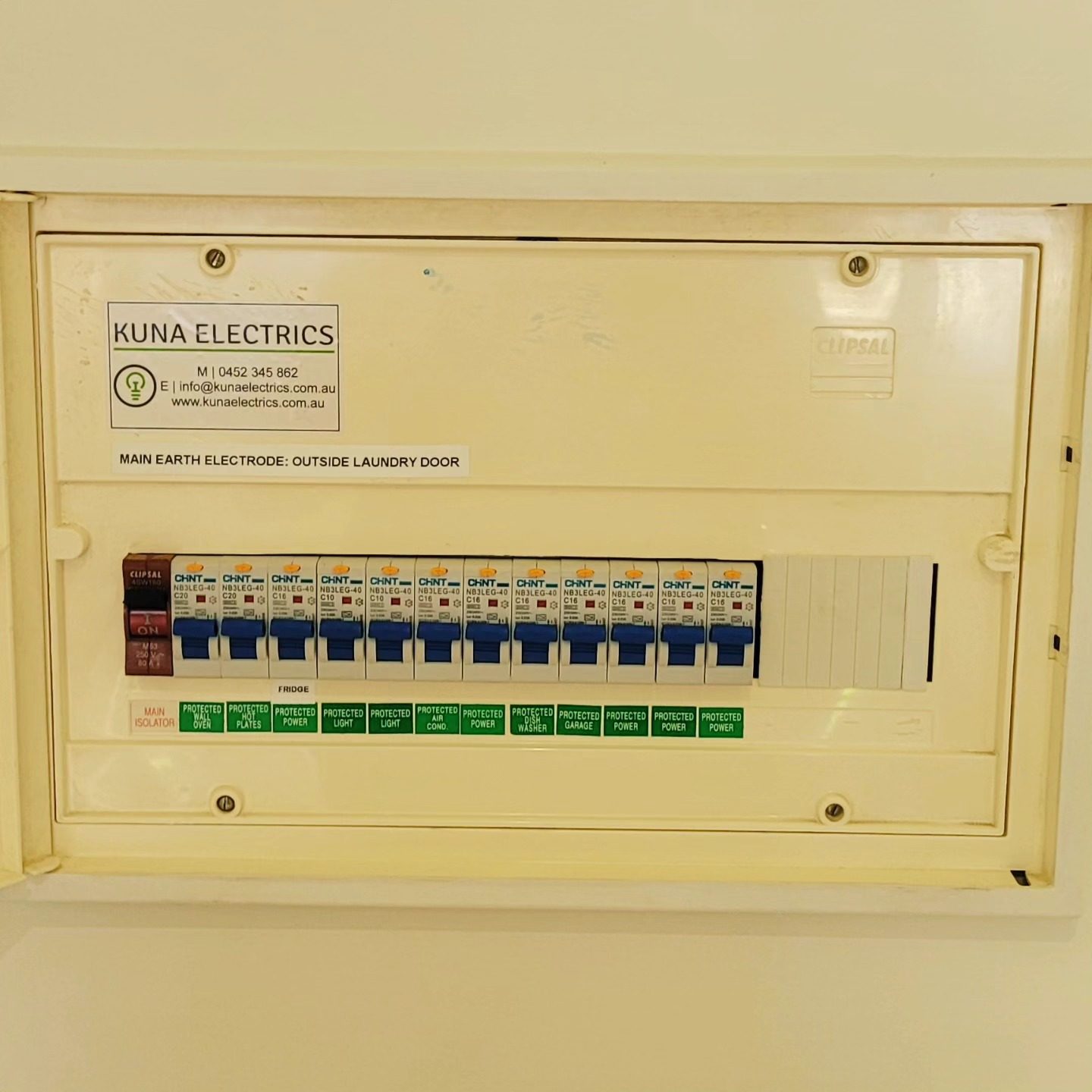 An indoor wall-mounted electrical distribution panel featuring modern circuit breakers for Switchboard Upgrades in Geelong